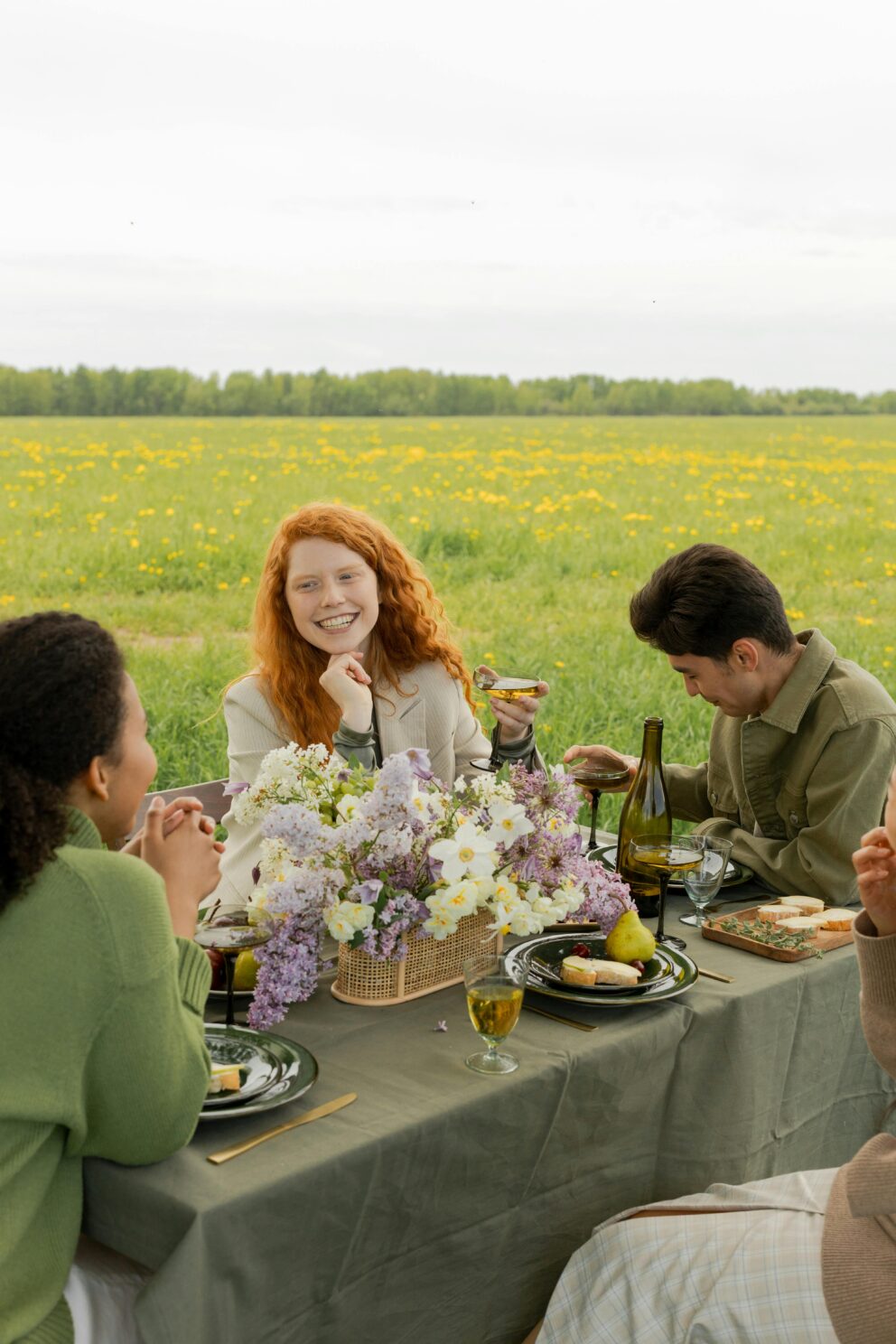 friends enjoying a spring picnic after getting Invisalign Union Square